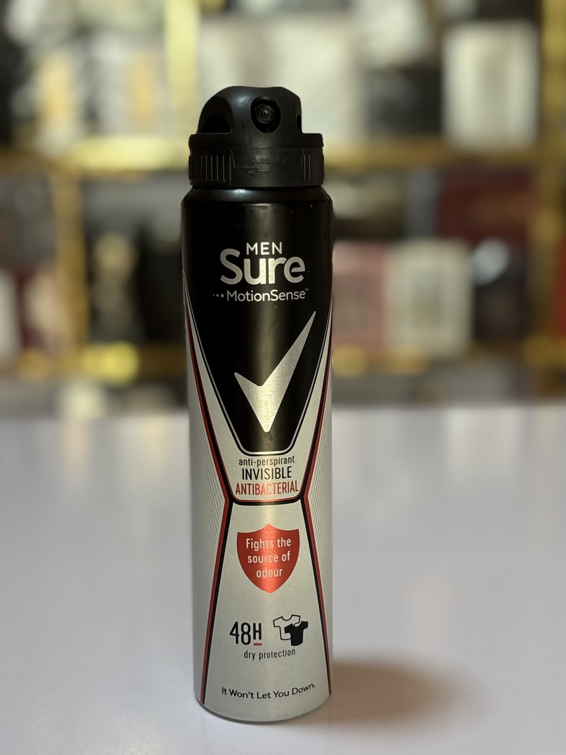 Sure Men MotionSense Invisible Antibacterial anti-perspirant deodorant spray.